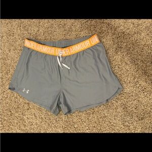 Under Armour shorts.  Like new.  Size medium. light grey with orange band.
